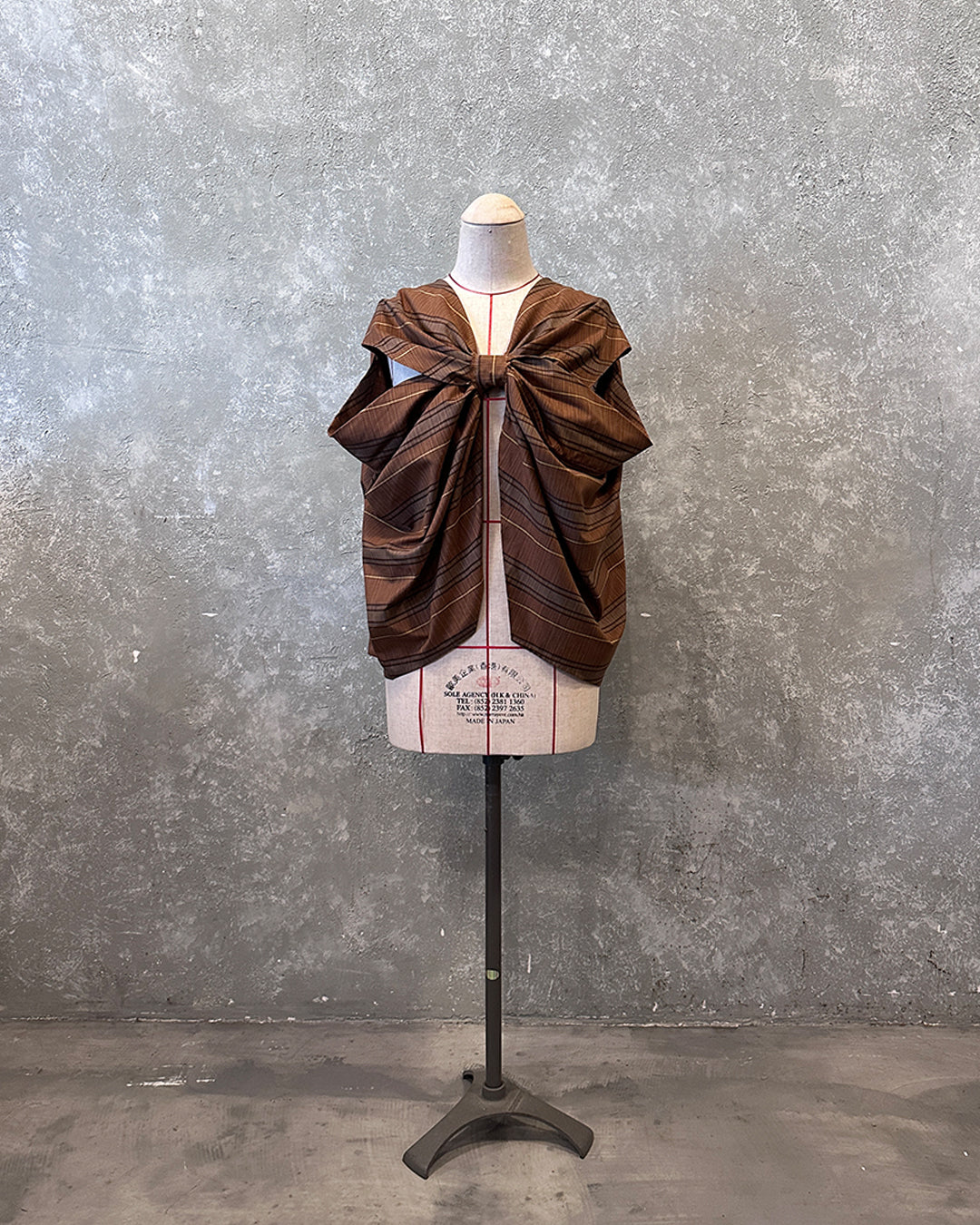 Cross drapery top in brown striped