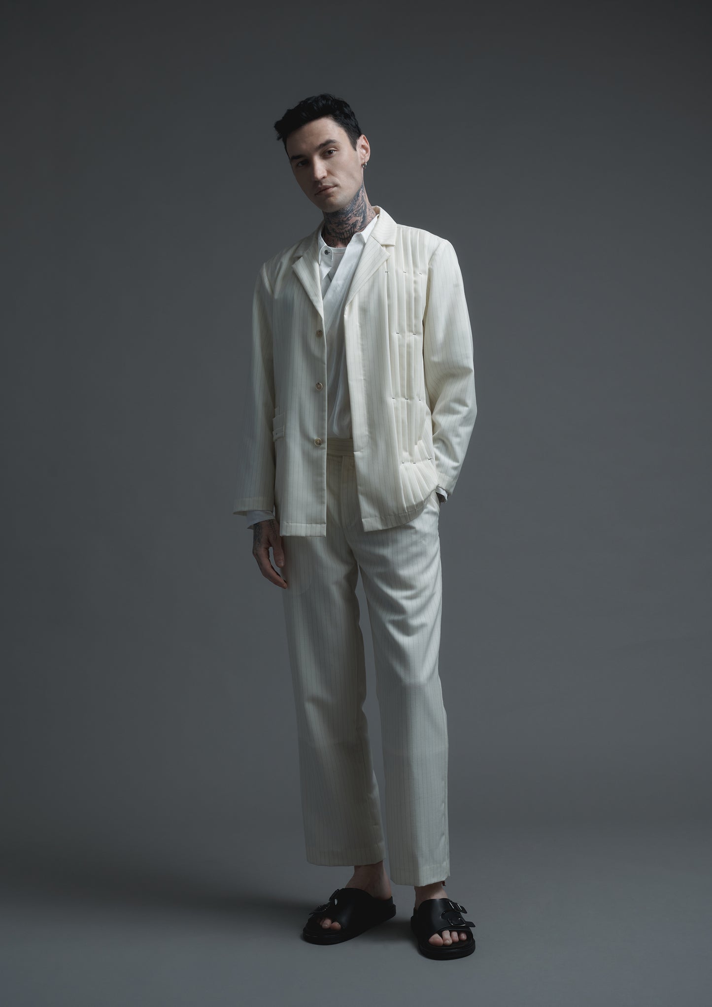 Patient trousers in cream striped woolen suiting