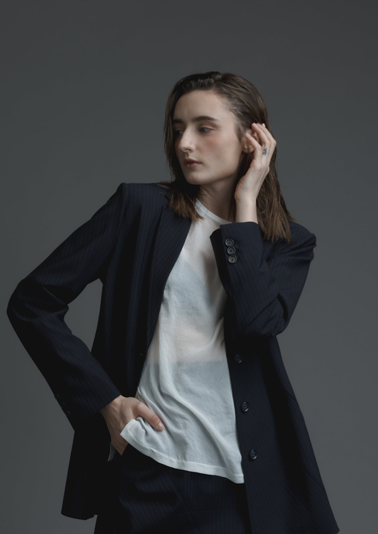 Slash cut blazer in navy striped woolen suiting