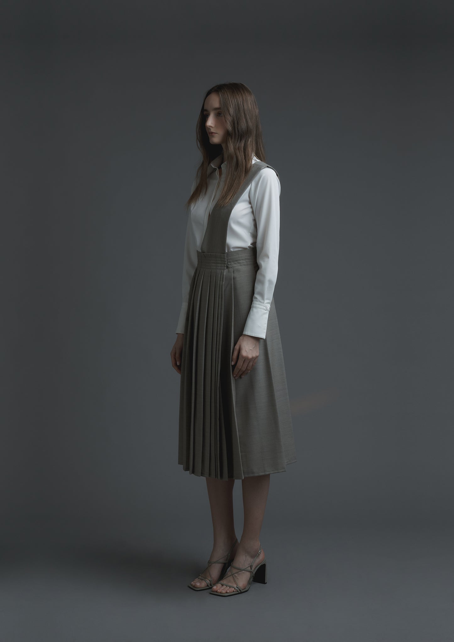 Uniform pleated skirt in beige striped suiting