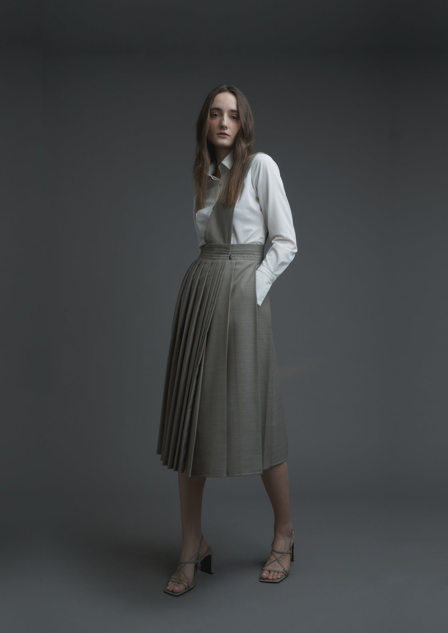 Uniform pleated skirt in beige striped suiting