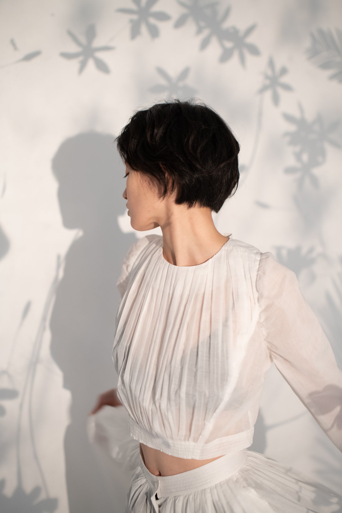 Puff sleeve hand pleated top