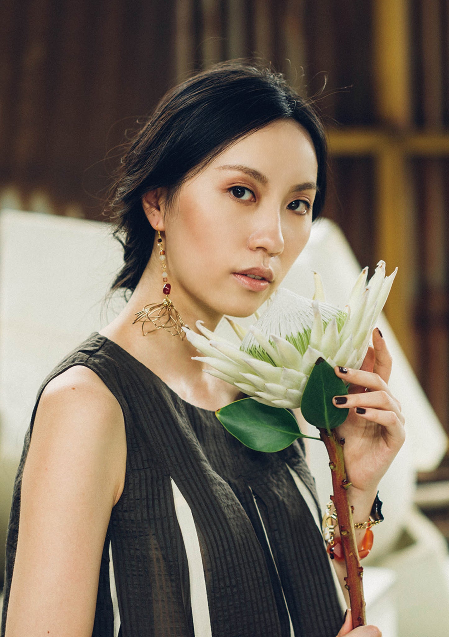 Floral in gold asymmetric earrings