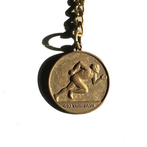 Vintage sports medal keychain