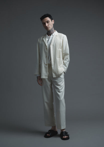 Patient pleated jacket in cream striped woolen suiting