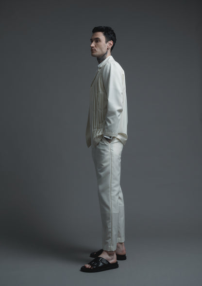 Patient pleated jacket in cream striped woolen suiting