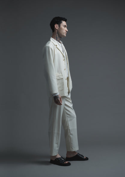 Patient pleated jacket in cream striped woolen suiting