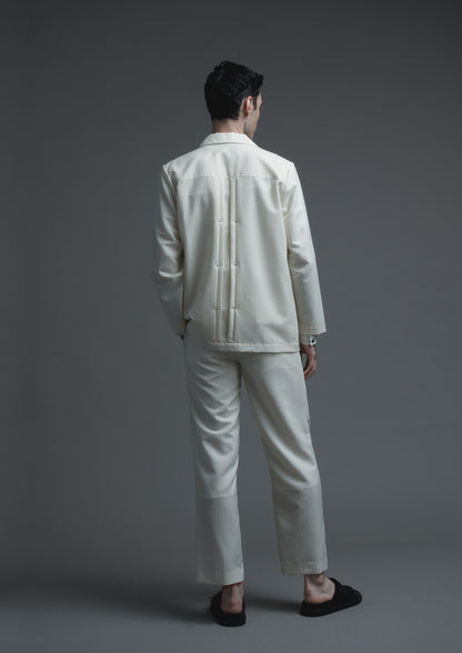 Patient pleated jacket in cream striped woolen suiting