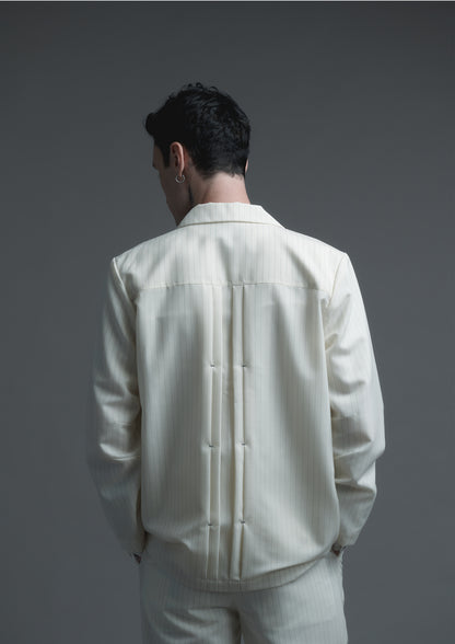 Patient pleated jacket in cream striped woolen suiting