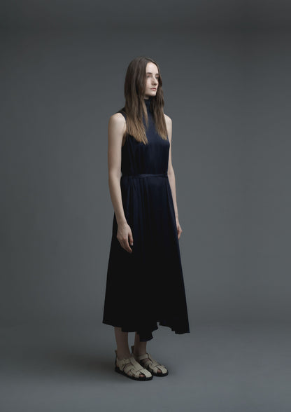 Turtle neck flare maxi dress in navy crease satin